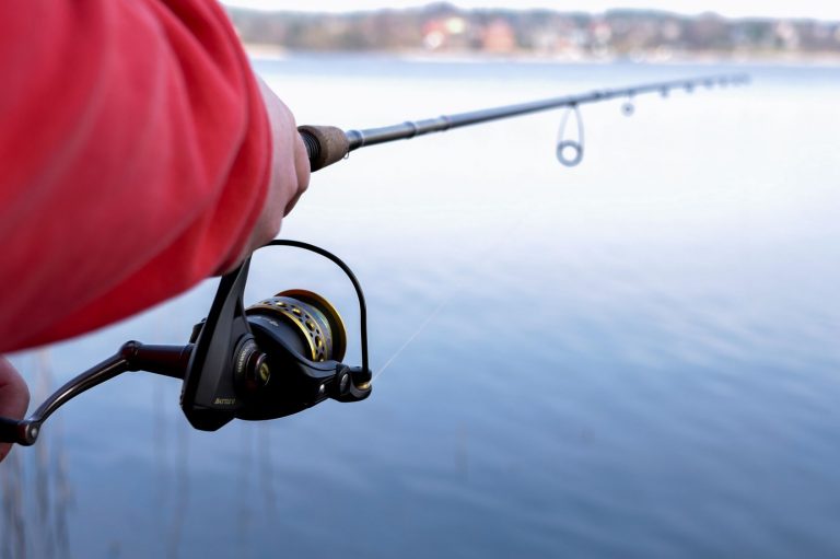 Fisherman Using a Spinning Reel