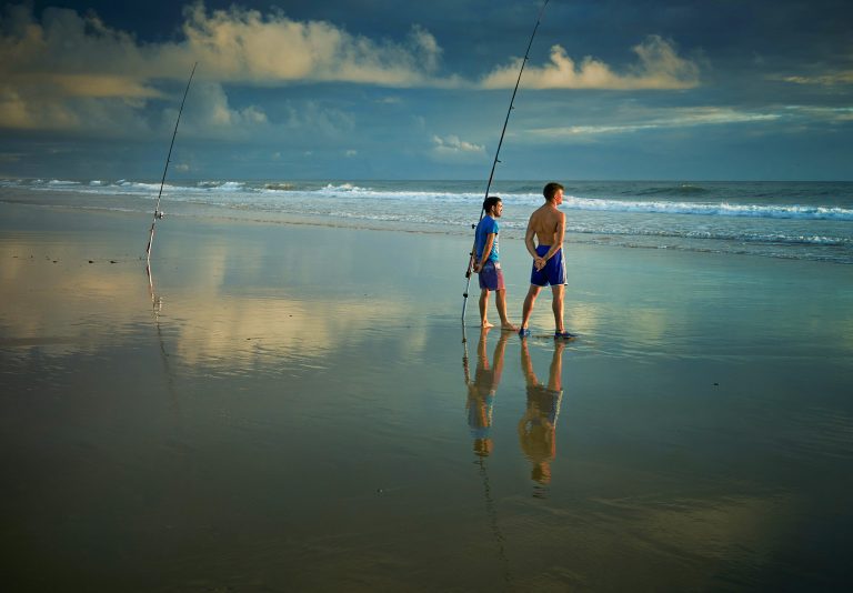 Two Men Fishing at the Beach