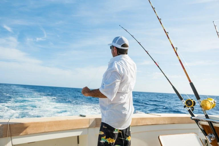 Man Standing in a Boat