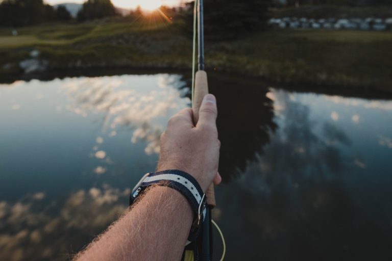 Man Holding a Fly Rod