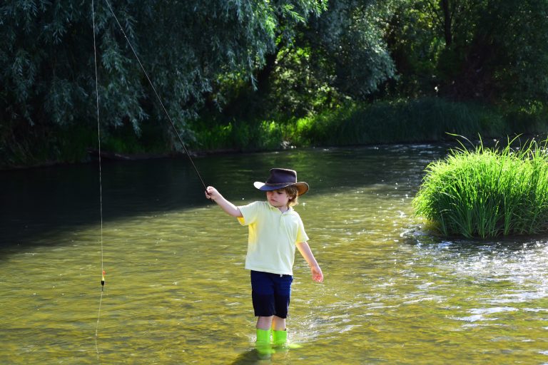 Child Playing with a Fishing Rod