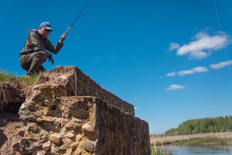 Man Fishing with a Tenkara Rod