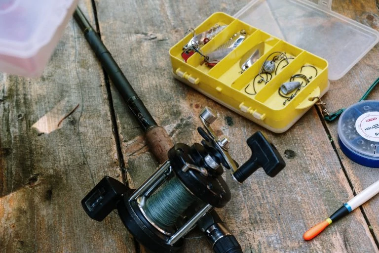 Fishing Gear on a Wooden Table