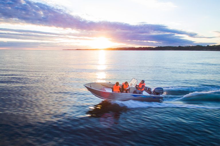 Family on a Motorboat