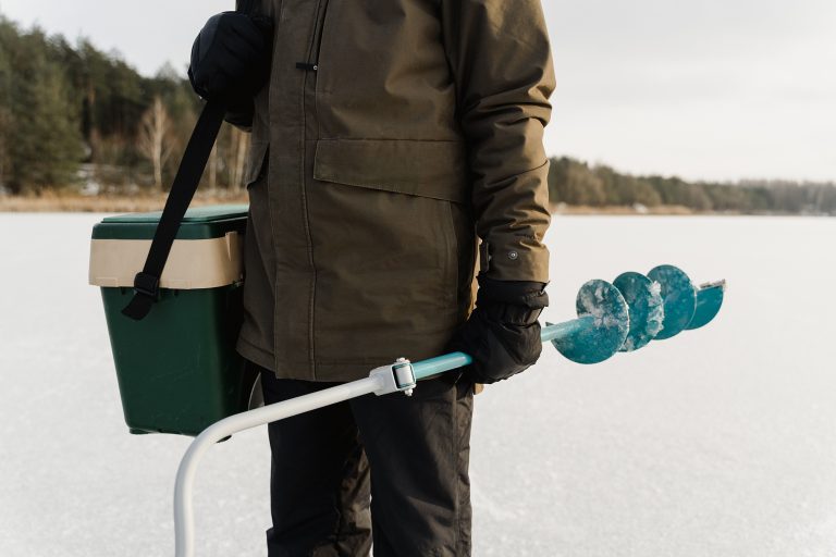 Fisherman Holding Gear While Wearing Gloves