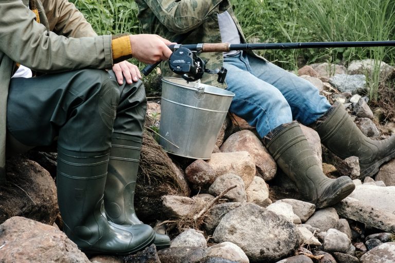 Fishermen Sitting at a Riverside