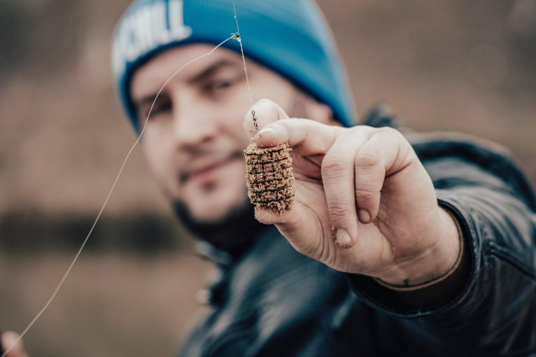 close up of bait in a persons hand